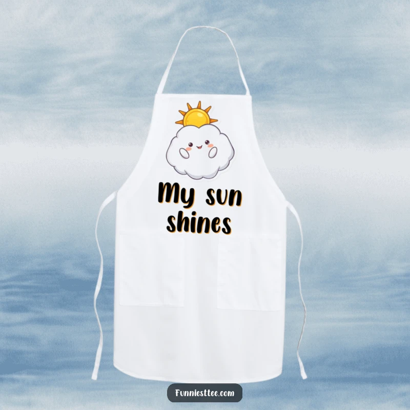 Funny apron showcasing a fluffy cloud character floating inverted, holding a sun, perfect for whimsical culinary creations.