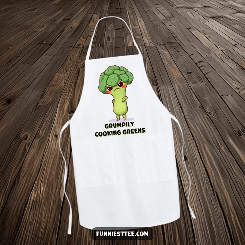 Funny grumpy broccoli apron featuring a cute floret attempting a handstand, a humorous and practical accessory for kitchen activities.