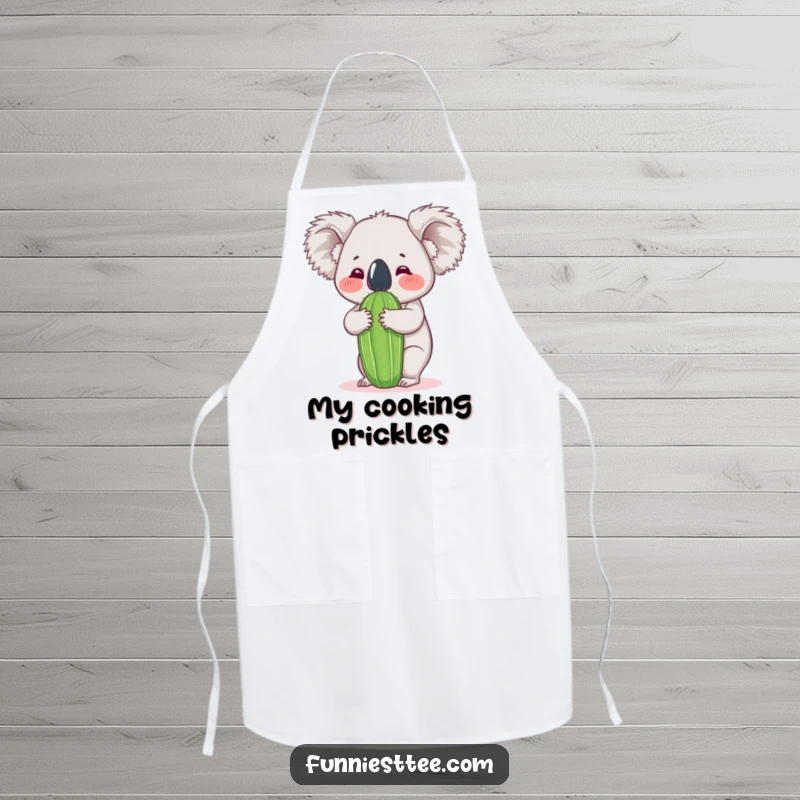 Funny koala apron depicting a koala's determined hug of a cactus, making meal prep a hilarious and memorable experience.