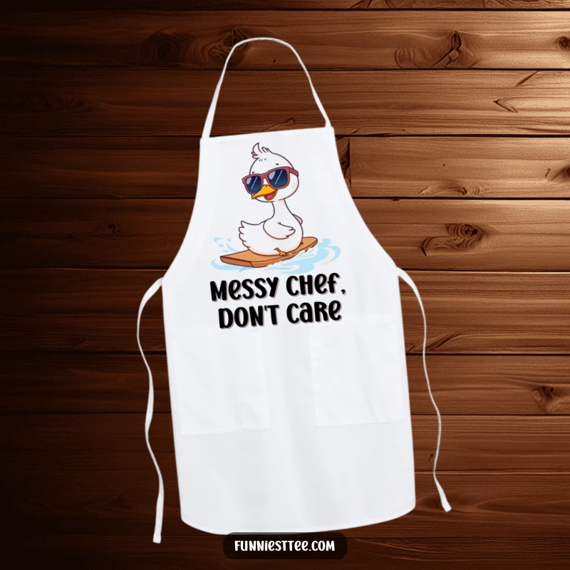 Funny goose wearing oversized sunglasses waterskiing backwards on an apron, a humorous and practical kitchen accessory.