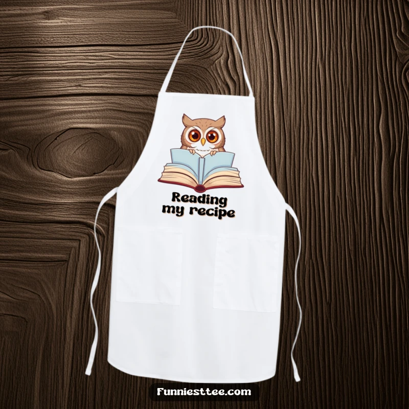 Funny owl apron featuring a curious owl peeking from a giant, open storybook, adding a whimsical touch to cooking.