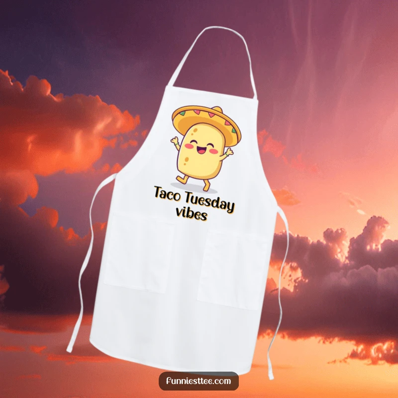 Funny apron featuring a giggling taco wearing a sombrero and tapping its feet, ready for kitchen fun.