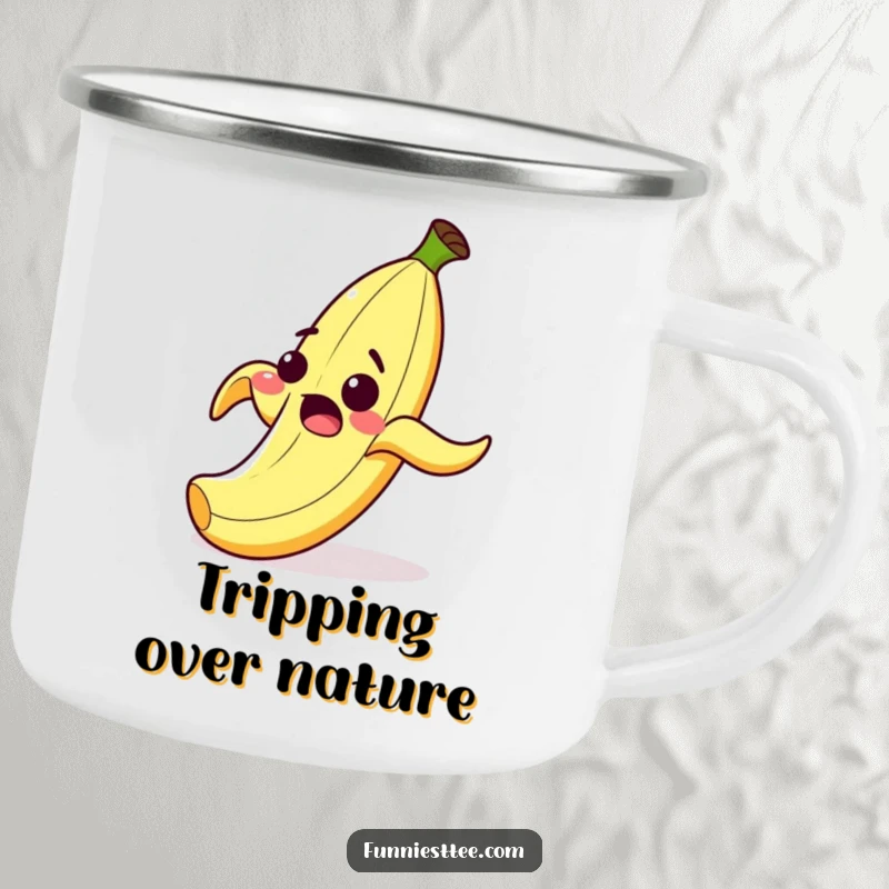 Funny camping mug featuring a surprised cartoon banana peel with a wide grin, comically slipping on its own peel, ideal for outdoor fun.