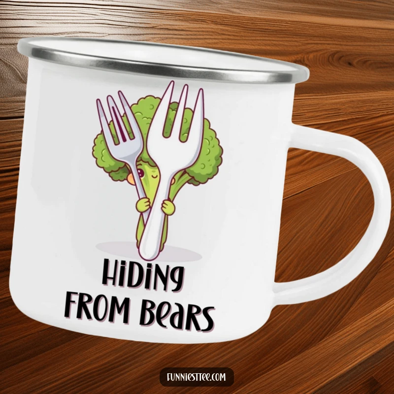 Funny camping mug with a shy broccoli character hiding behind a large fork and spoon, built for outdoor adventures and humorous enjoyment.