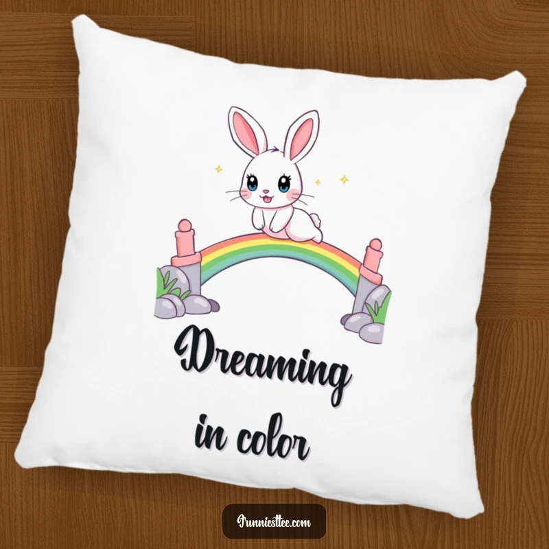 Funny pillow with a playful rabbit, sparkling eyes, leaping over a rainbow bridge, bringing soft comfort and joy.