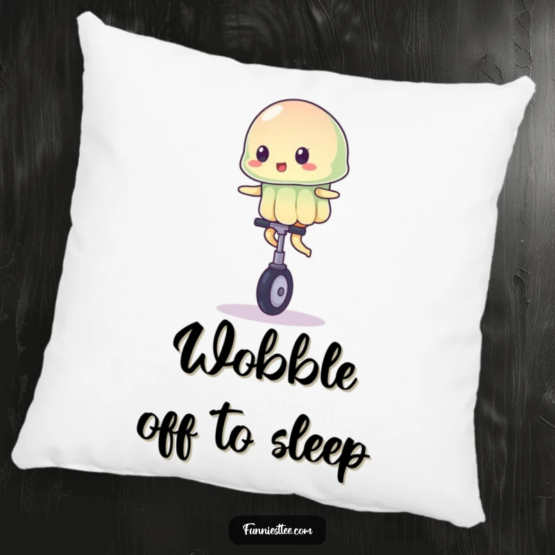 Funny pillow featuring a wobbly jelly character precariously balanced on a tiny unicycle, designed for comical comfort and lighthearted vibes.