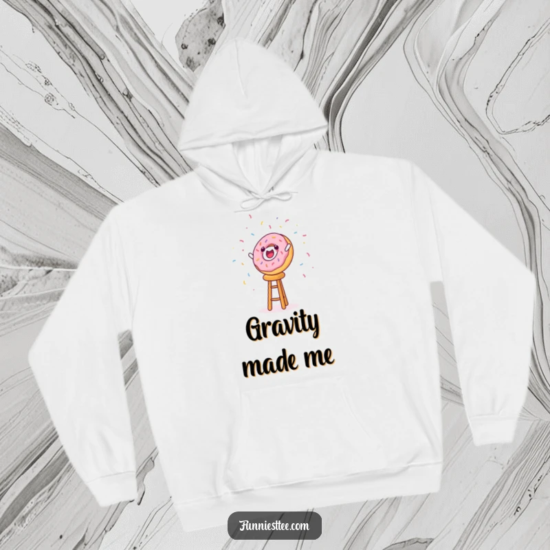 Warm and comfortable funny hoodie with a cheerful donut character dramatically falling off a stool, sprinkles flying.
