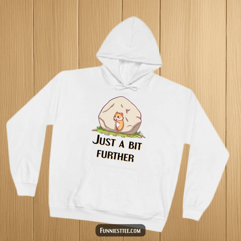 Funny hoodie depicting a tiny hamster's humorous and arduous task of pushing an oversized boulder, symbolizing perseverance.