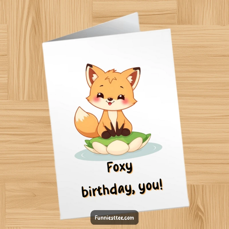 Funny Free Printable Birthday card with a happy fox cub grinning widely while expertly balancing on a floating lily pad.