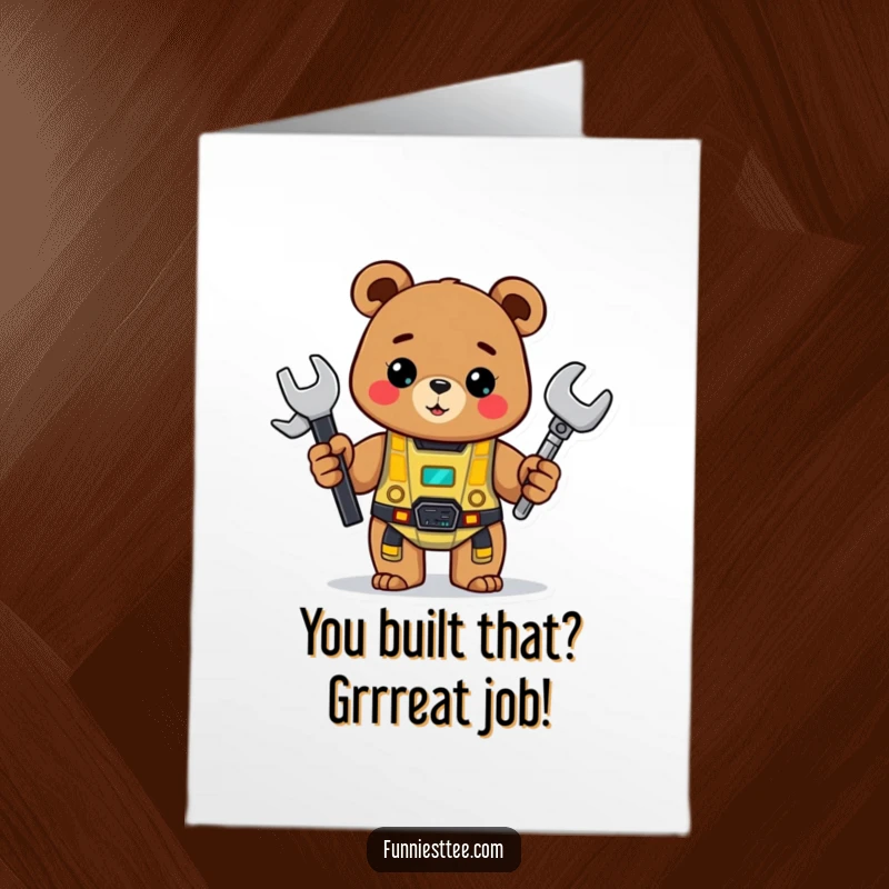 Funny Free Printable bear holding a wrench, displaying a half-built robot for congratulations.