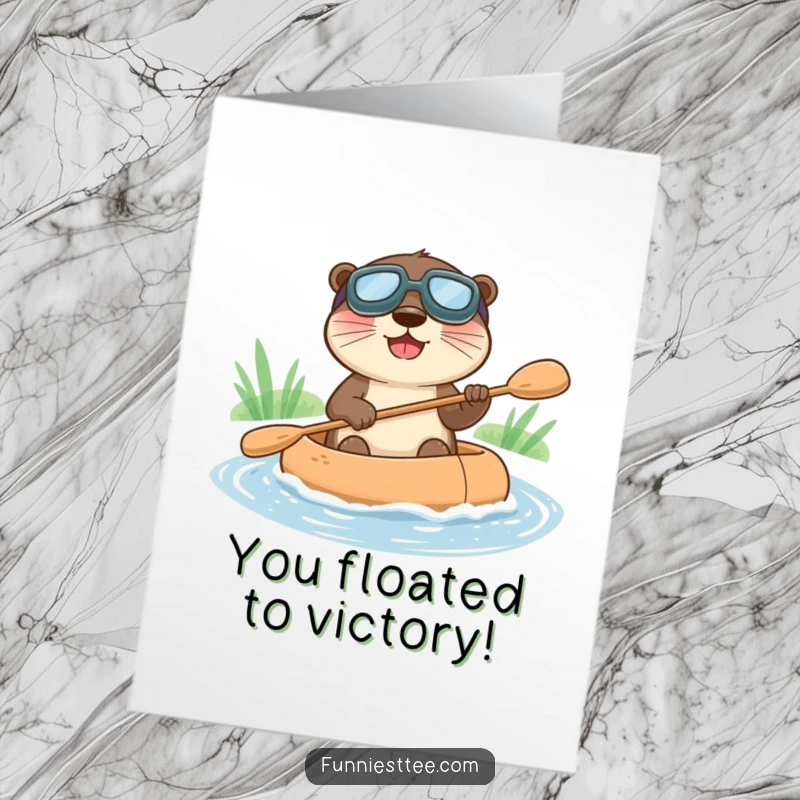 Funny Free Printable Congratulations Card: Happy otter in goggles paddles a raft, celebrating achievements with a joyful, watery vibe.
