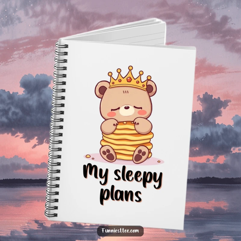 Funny sleepy bear notebook featuring a crowned bear character balancing pancakes, inspiring organized writing and morning plans.