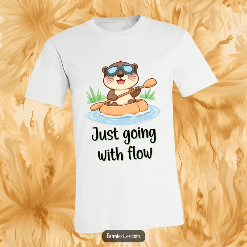 Funny t-shirt with a happy otter in goggles, paddling a raft down a stream, embodying pure joy.