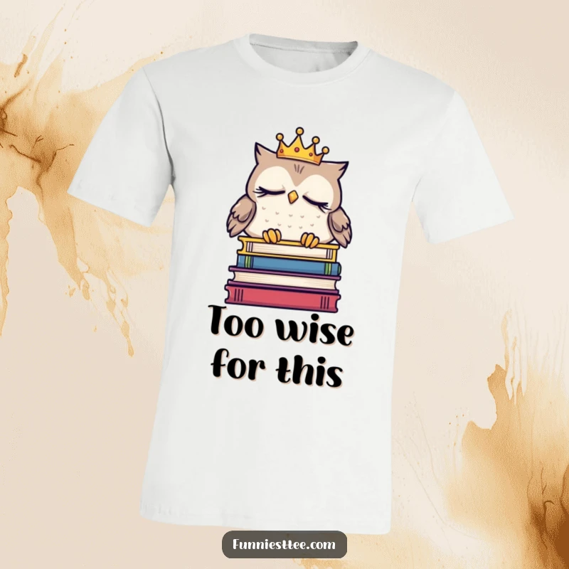 Funny sleepy owl t-shirt with a tiny crown, dozing on books, capturing a humorous and relatable image for bookworms and nap enthusiasts.