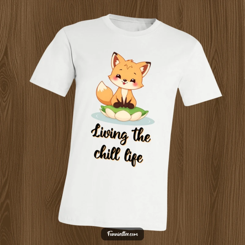 Funny fox cub t-shirt showing a happy fox cub with a grin, balancing precariously on a floating lily pad.
