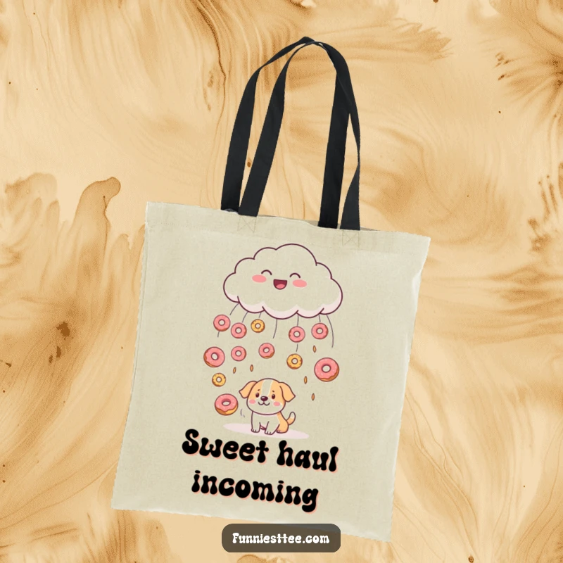 Funny tote bag depicting a cheerful cloud raining donuts onto a bewildered dog, a whimsical and charming accessory for carrying everyday items.